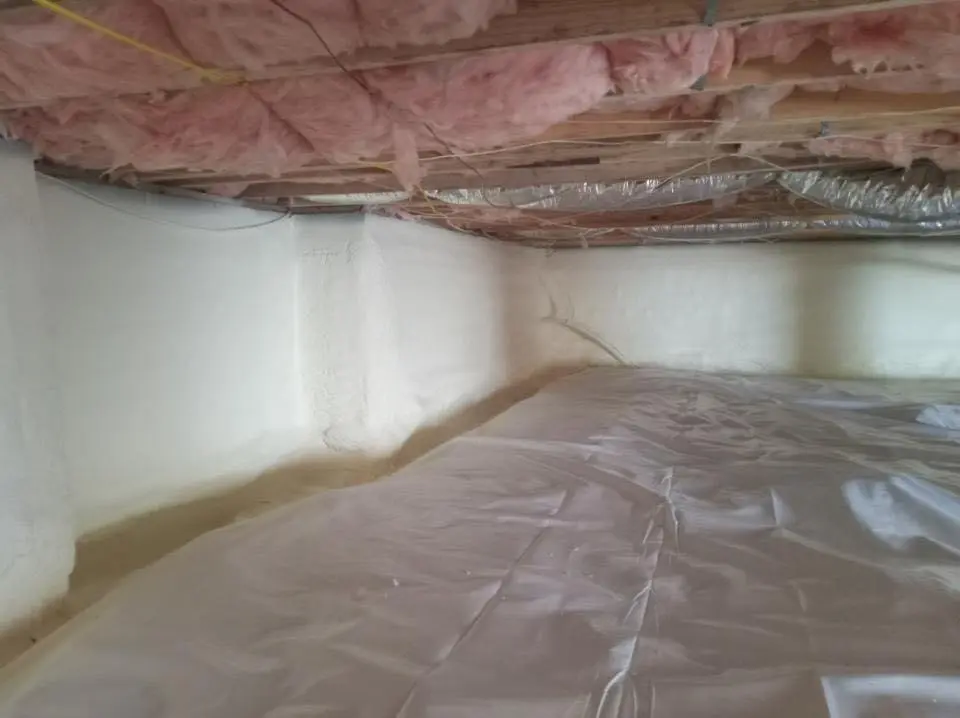 Crawl space encapsulation with closed-cell spray foam for Storm Damage Roof Repair in Douglasville